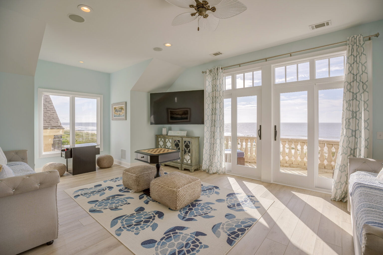 Sleepover room bunkroom trundle bed game room interior design coastal design South Carolina With arcade machines pac man