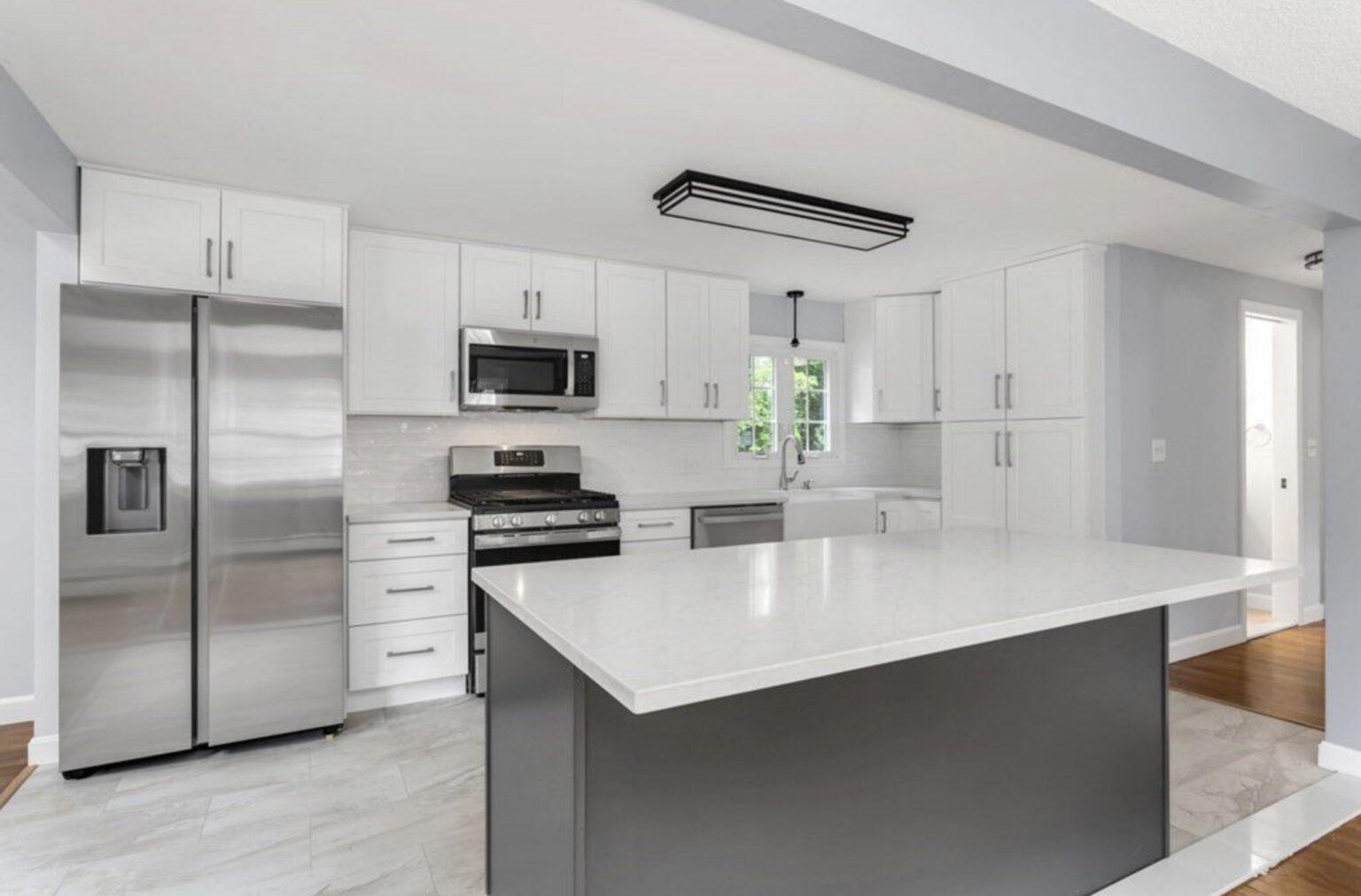 Updated modern kitchen colonial family home on a budget grey and white marble Franklin Massachusetts