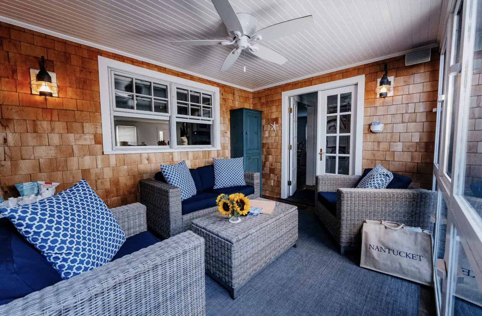 Screened in summer porch cedar shingles navy accents nantucket Massachusetts